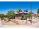 Exterior view showcasing the well-kept yard and charming home on a corner lot at 4976 S Sugarberry Ln, Gilbert, AZ 85298