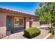 Charming exterior view showcasing the home's curb appeal with manicured landscaping at 4976 S Sugarberry Ln, Gilbert, AZ 85298