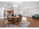 Spacious living room featuring hardwood floors and ample natural light, perfect for Gathering gatherings at 4976 S Sugarberry Ln, Gilbert, AZ 85298