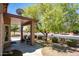 Inviting front porch with comfortable seating, perfect for enjoying the tranquil neighborhood views at 4976 S Sugarberry Ln, Gilbert, AZ 85298