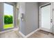 Bathroom featuring walk-in shower, exterior access, and a bright window view at 5515 E Dale Ln, Cave Creek, AZ 85331