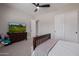 Comfortable bedroom with carpet floors, ceiling fan, and a sliding door closet at 5515 E Dale Ln, Cave Creek, AZ 85331