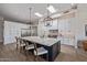 Bright kitchen with an expansive island, skylights, and sleek cabinetry at 5515 E Dale Ln, Cave Creek, AZ 85331