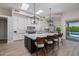 Gourmet kitchen with a large island, pendant lighting, and high-end appliances at 5515 E Dale Ln, Cave Creek, AZ 85331