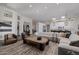 Expansive living area blending modern decor with a seamless flow to the kitchen, featuring an open layout and plush seating at 5515 E Dale Ln, Cave Creek, AZ 85331