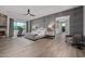 Spacious bedroom featuring decorative wall, fireplace, and en-suite bathroom access at 5515 E Dale Ln, Cave Creek, AZ 85331
