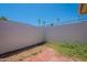 Enclosed backyard featuring a wall and patio area ready for personalization at 556 N Hobson Plz, Mesa, AZ 85203