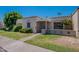 Lovely single-story home with well-kept landscaping and a covered front porch entry at 556 N Hobson Plz, Mesa, AZ 85203