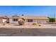 Inviting single-story home with a neatly maintained front yard and attached two-car garage at 5633 E Colby St, Mesa, AZ 85205