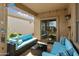 Inviting covered back patio with outdoor seating, perfect for enjoying the Arizona weather at 5810 E Nora St, Mesa, AZ 85215