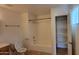 Bathroom featuring a shower-tub combo, tile floors, and built-in shelving at 719 E Broadway Ave, Apache Junction, AZ 85119