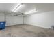 Spacious garage with an automatic door and ample room for parking and storage at 719 E Broadway Ave, Apache Junction, AZ 85119