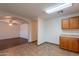 Bright kitchen space leads to an open-plan living area, creating a seamless flow at 719 E Broadway Ave, Apache Junction, AZ 85119