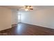 Bright and airy living room, featuring sleek, durable wood-look floors, perfect for modern living at 719 E Broadway Ave, Apache Junction, AZ 85119