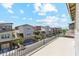 Stunning balcony view overlooking a tidy residential street, complete with blue sky at 732 W Flintlock Way, Chandler, AZ 85286