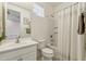 Bathroom featuring a shower/tub combo with modern fixtures and ample counter space at 732 W Flintlock Way, Chandler, AZ 85286
