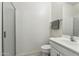 Bathroom featuring a glass enclosed walk-in shower, a toilet, and a white vanity at 732 W Flintlock Way, Chandler, AZ 85286