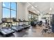 Workout gym showcasing treadmills and other exercise equipment with ample natural light at 732 W Flintlock Way, Chandler, AZ 85286