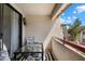 This balcony provides outdoor seating with black and white modern décor and ample sunlight at 750 E Northern Ave # 2143, Phoenix, AZ 85020
