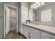 Elegant bathroom features a granite countertop, modern vanity, and a tiled shower for a spa-like experience at 750 E Northern Ave # 2143, Phoenix, AZ 85020