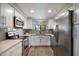 Bright kitchen featuring stainless steel appliances and gray subway tile backsplash at 750 E Northern Ave # 2143, Phoenix, AZ 85020