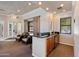 Convenient kitchenette with dark granite counters and wooden cabinets for residents at 750 E Northern Ave # 2143, Phoenix, AZ 85020