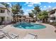 Serene swimming pool with lounge chairs and a gazebo, perfect for relaxation and recreation at 750 E Northern Ave # 2143, Phoenix, AZ 85020