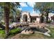 Stunning water feature at the entrance with rocks, plants, and peaceful ambiance at 750 E Northern Ave # 2143, Phoenix, AZ 85020