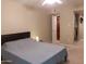 Comfortable bedroom featuring neutral walls and ample natural light from doorway at 7970 E Camelback Rd # 209, Scottsdale, AZ 85251