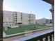 Exterior view showcasing community amenities, landscaping, and architecture at 7970 E Camelback Rd # 209, Scottsdale, AZ 85251