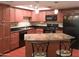 Charming kitchen with stainless steel appliances, granite countertops, and decorative lighting fixtures at 7970 E Camelback Rd # 209, Scottsdale, AZ 85251