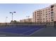 Well-maintained community tennis courts with lights next to high-rise condos at 7970 E Camelback Rd # 209, Scottsdale, AZ 85251