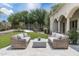 Serene backyard featuring a cozy seating area and manicured landscaping at 8229 N Ridgeview Dr, Paradise Valley, AZ 85253