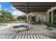 Inviting backyard with a water feature, covered patio, and comfortable outdoor seating at 8229 N Ridgeview Dr, Paradise Valley, AZ 85253