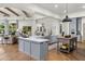 Spacious kitchen featuring a large island, modern appliances, and seamlessly blends into the living area at 8229 N Ridgeview Dr, Paradise Valley, AZ 85253