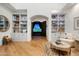 Inviting living room with custom built-ins, hardwood floors, and a cozy seating area at 8229 N Ridgeview Dr, Paradise Valley, AZ 85253