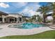 Stunning backyard with a large pool, spa, waterfall feature, and lush landscaping at 8229 N Ridgeview Dr, Paradise Valley, AZ 85253