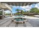 Gorgeous backyard showcasing a pool, spa, water feature, lush landscaping, and beautiful desert views at 8229 N Ridgeview Dr, Paradise Valley, AZ 85253