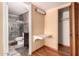 Bathroom featuring an updated shower with tile surround and built-in vanity area at 8238 E Jackrabbit Rd, Scottsdale, AZ 85250