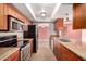 Well-equipped kitchen featuring stainless steel appliances and granite countertops at 8238 E Jackrabbit Rd, Scottsdale, AZ 85250