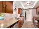 Kitchen featuring granite countertops and stainless steel dishwasher and sink at 8238 E Jackrabbit Rd, Scottsdale, AZ 85250