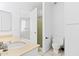 Bathroom featuring white cabinetry and a shower with sliding glass doors at 8414 N Central Ave # B, Phoenix, AZ 85020
