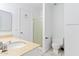 Bathroom featuring white cabinetry and a shower with sliding glass doors at 8414 N Central Ave # B, Phoenix, AZ 85020