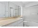 Well-lit bathroom with a vanity and bath/shower combo at 8414 N Central Ave # B, Phoenix, AZ 85020