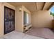 Private front patio with brick flooring, security door and shade at 8414 N Central Ave # B, Phoenix, AZ 85020