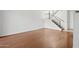 Bright living room featuring hardwood floors and a staircase to the upper level at 8414 N Central Ave # B, Phoenix, AZ 85020