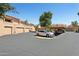 Parking area with garages and covered carports at this property at 8414 N Central Ave # B, Phoenix, AZ 85020