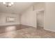 Bright living room features tile and wood flooring, large window, and high ceilings at 8627 W Morrow Dr, Peoria, AZ 85382