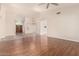 Spacious open-concept living area showcasing tile flooring, wooden floors, and natural light at 8627 W Morrow Dr, Peoria, AZ 85382
