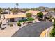 Expansive aerial view of the property highlighting the home and its well-manicured landscaping at 920 N 104Th St, Mesa, AZ 85207